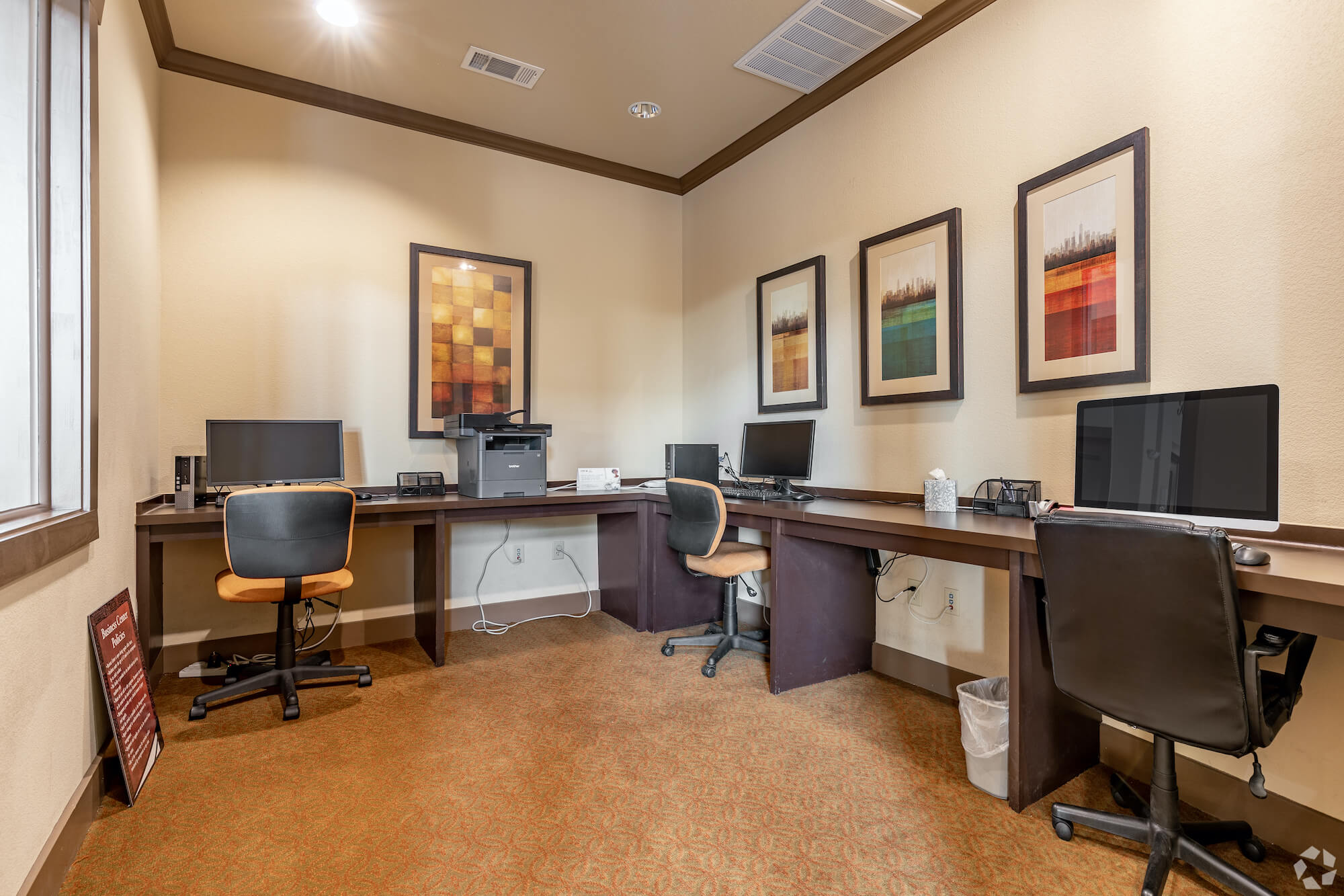 The business center featuring computers for residents to use.