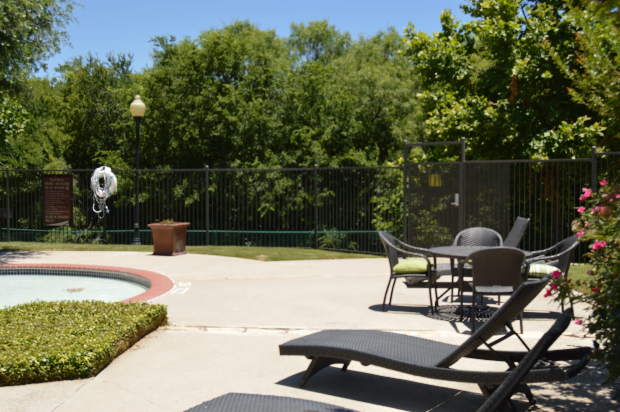 Seating along the side of the pool.